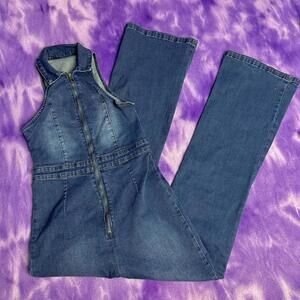 Navy blue denim sleeveless jumpsuit with zipper detail and collar